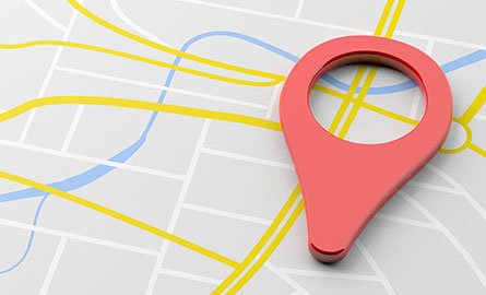 map pin laying flat on map